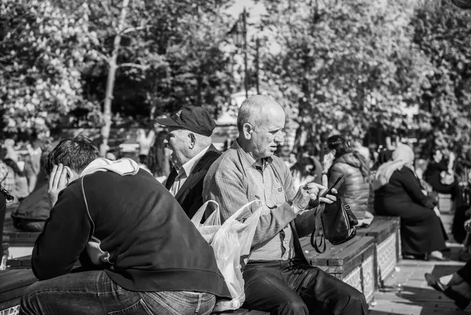Black and white photography, art zoom studio, old man, mobile phone, istanbul, 
